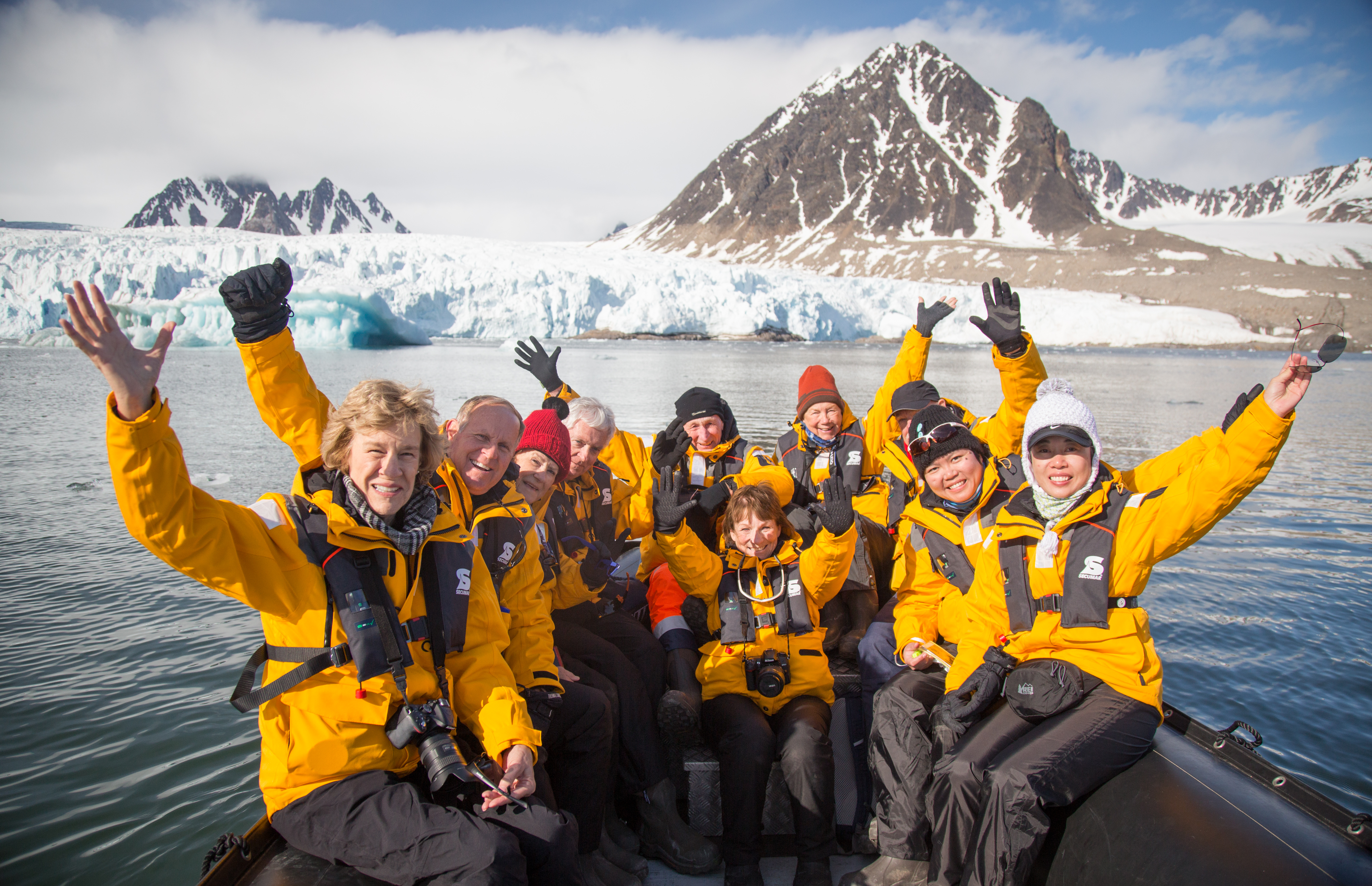 Quark Expeditions passengers set out on a zodiac to meet the glaciers